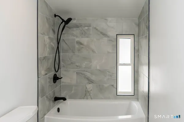 a bathroom with a bathtub