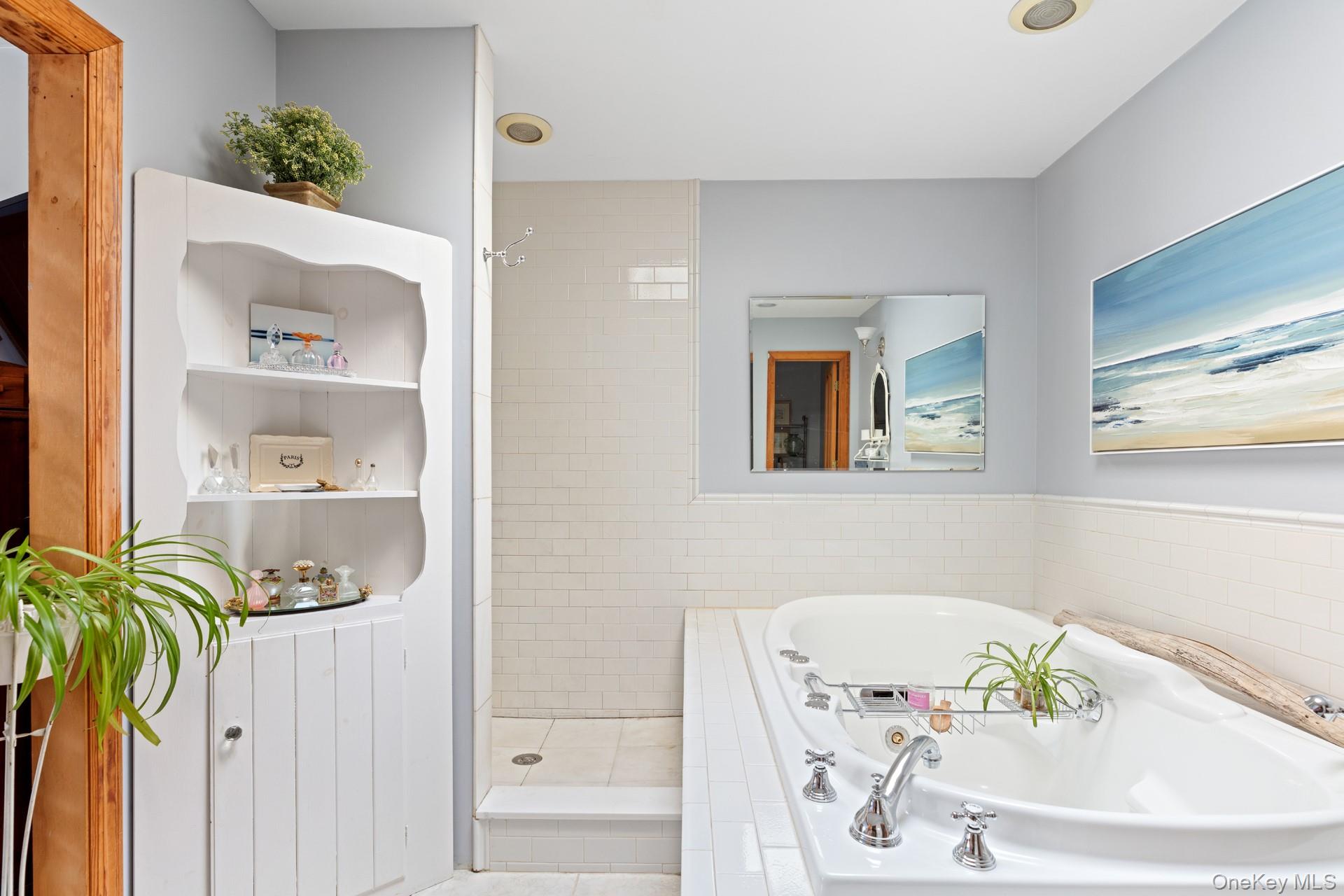 2 Sunset Road Sag Harbor, NY 11963 - Photo 11 of 21 Bathroom with a stall shower and a bath