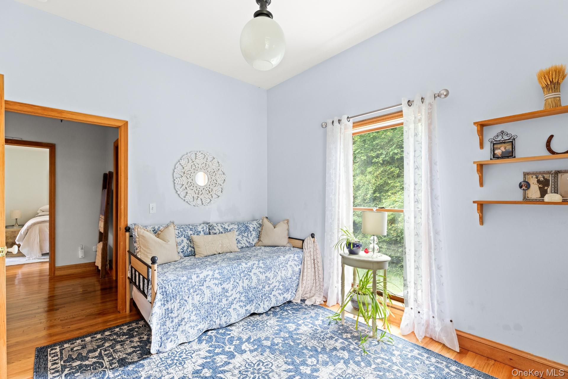 2 Sunset Road Sag Harbor, NY 11963 - Photo 15 of 21 Bedroom featuring wood finished floors and baseboards
