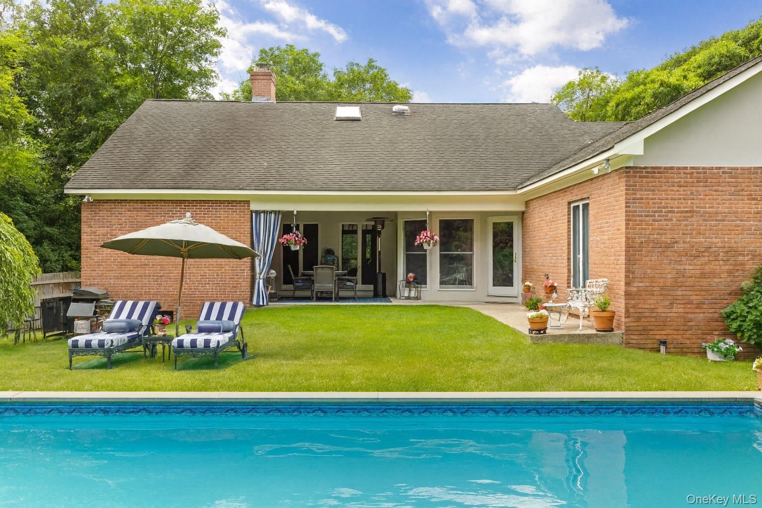 2 Sunset Road Sag Harbor, NY 11963 - Photo 17 of 21 a view of house with outdoor space