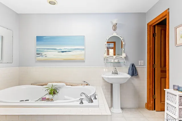 a bathroom with a sink and a bathtub