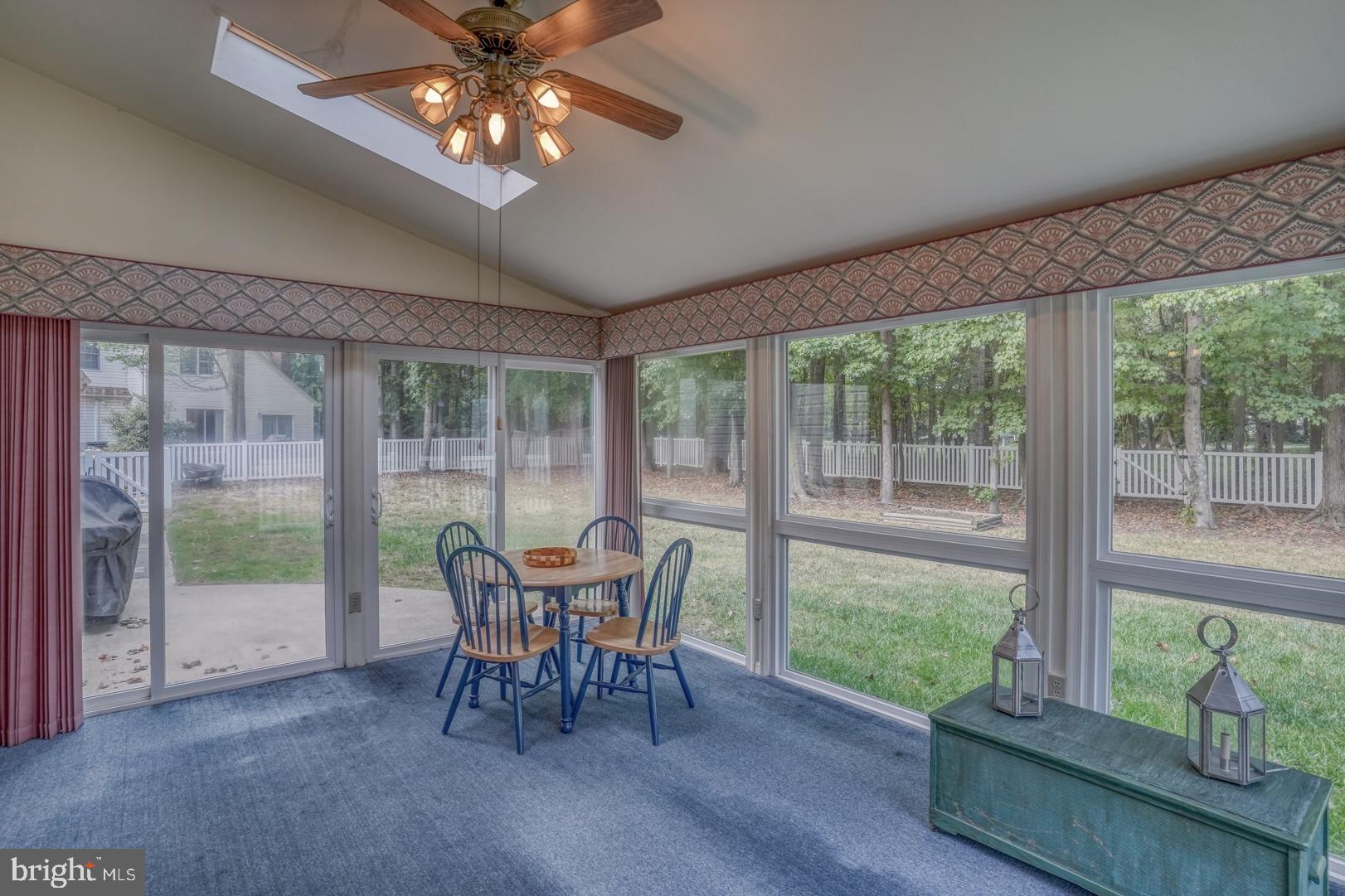 165 Burning Tree Road Dover, DE 19904 - Photo 24 of 48 Ceiling fan and a sliding glass door to the patio