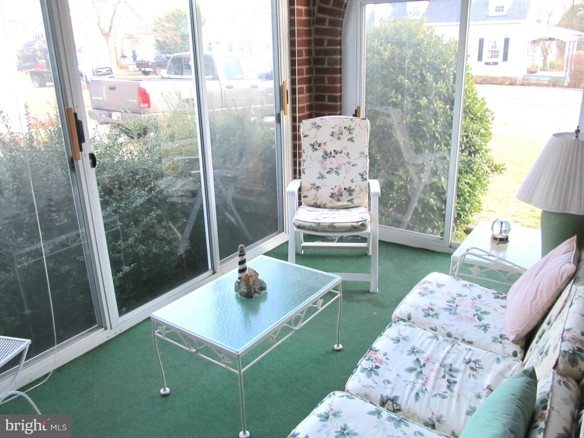 422 Forest View Road Linthicum, MD 21090 - Photo 17 of 25 a view of a room that has a bed and glass door