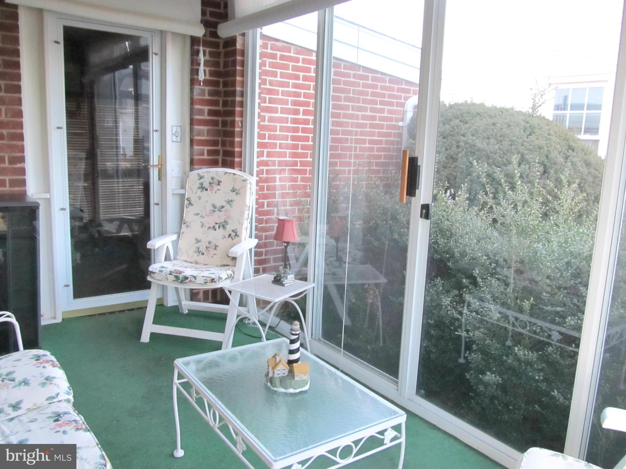 422 Forest View Road Linthicum, MD 21090 - Photo 19 of 25 a view of a room with a table and chairs