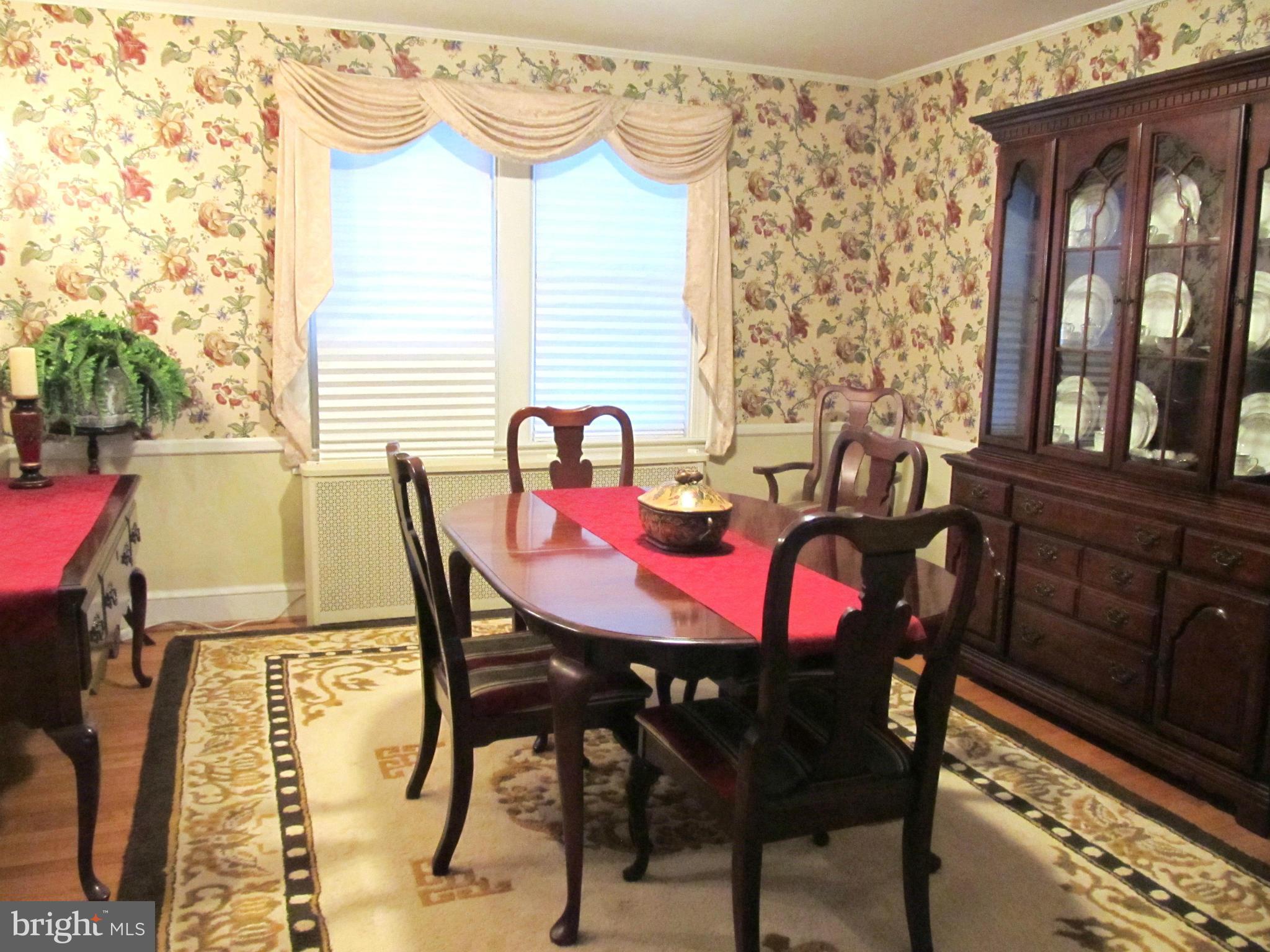 422 Forest View Road Linthicum, MD 21090 - Photo 7 of 25 a view of a dining room with furniture and window