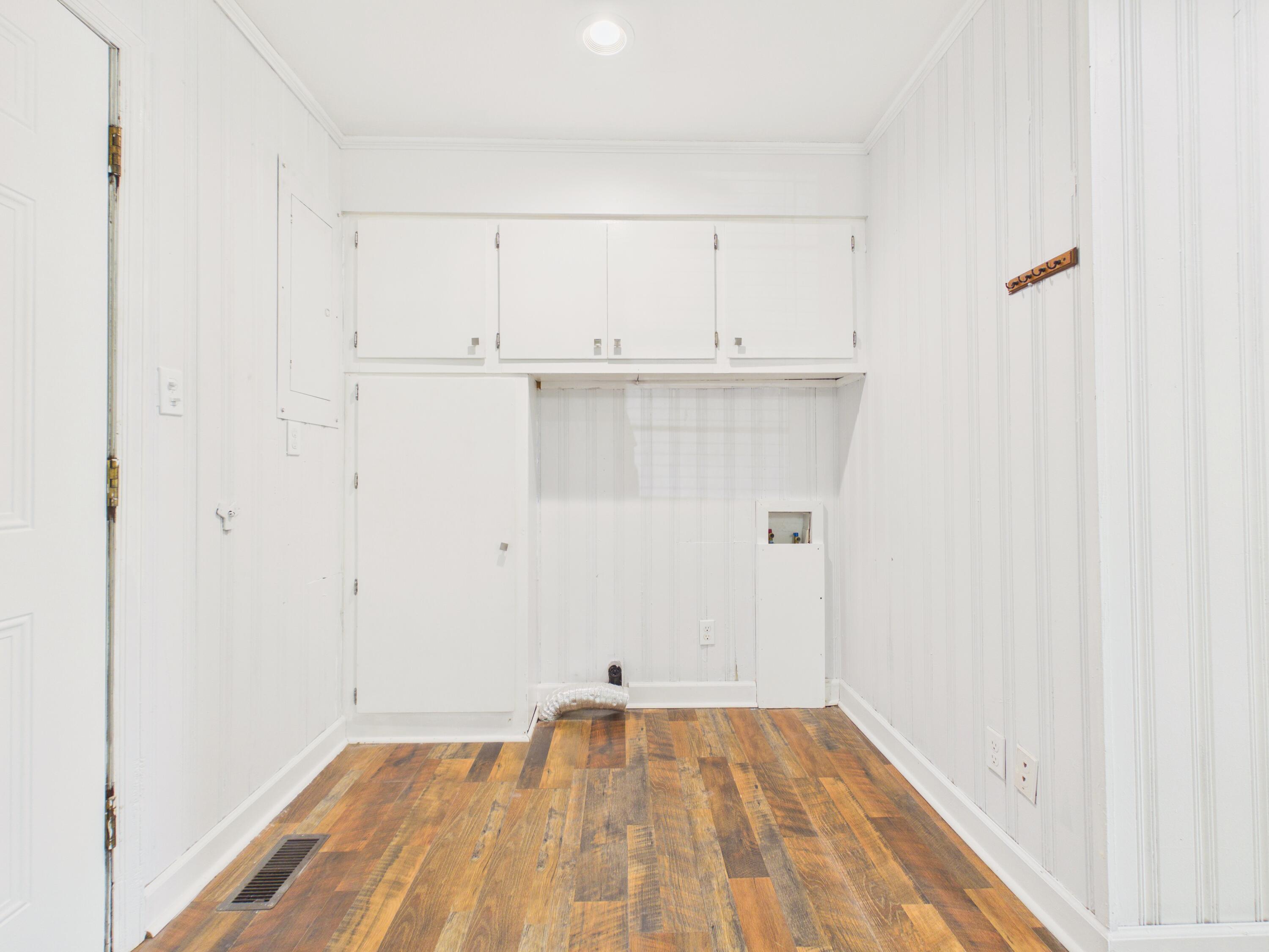 800 Old Whiskey Road South New Ellenton, SC 29809 - Photo 16 of 31 a view of a room with wooden floor and cabinets