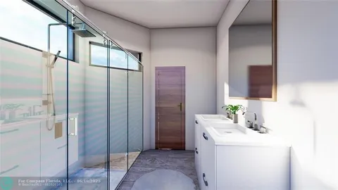 a bathroom with a granite countertop sink a mirror and shower