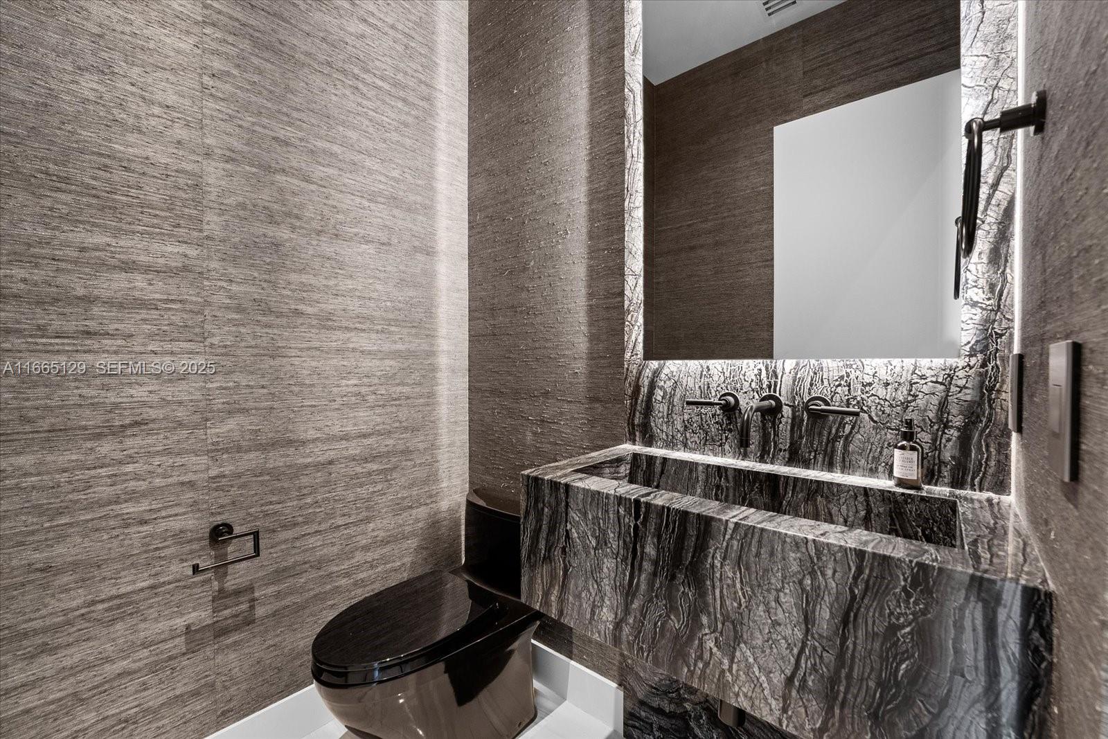 2811 South Bayshore Drive, Unit 4C Miami, FL 33133 - Photo 11 of 37 a close up of a sink