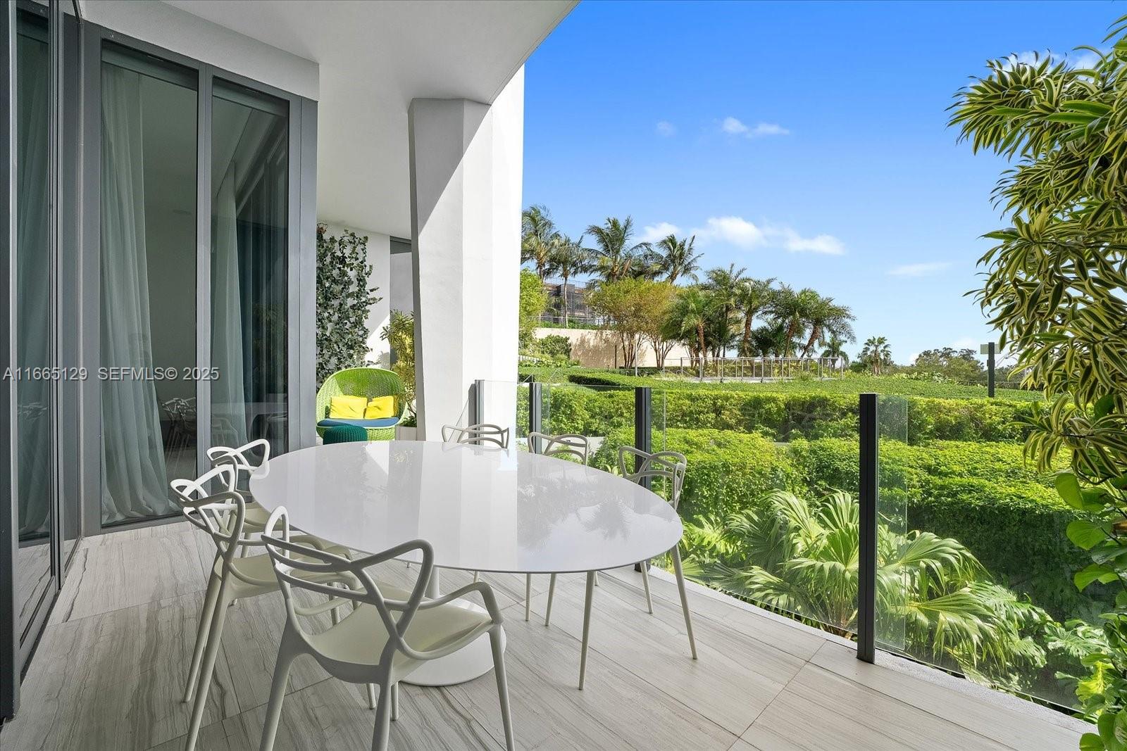 2811 South Bayshore Drive, Unit 4C Miami, FL 33133 - Photo 19 of 37 a outdoor view with a sitting space