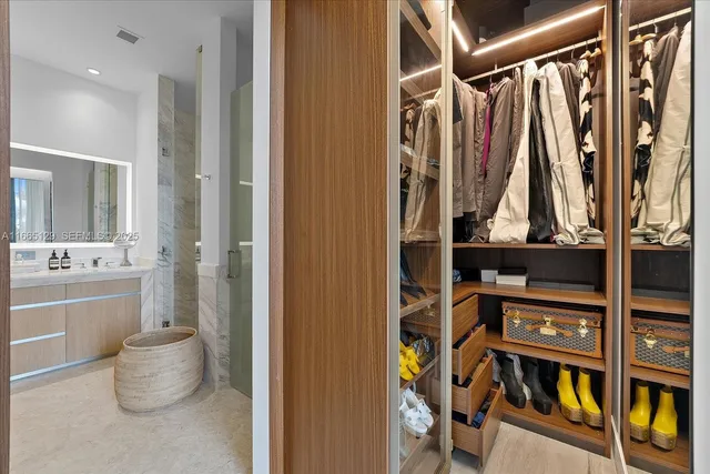 a bathroom with a bathtub and a sink