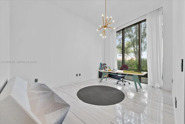 a bathroom with a granite countertop sink a toilet and a mirror