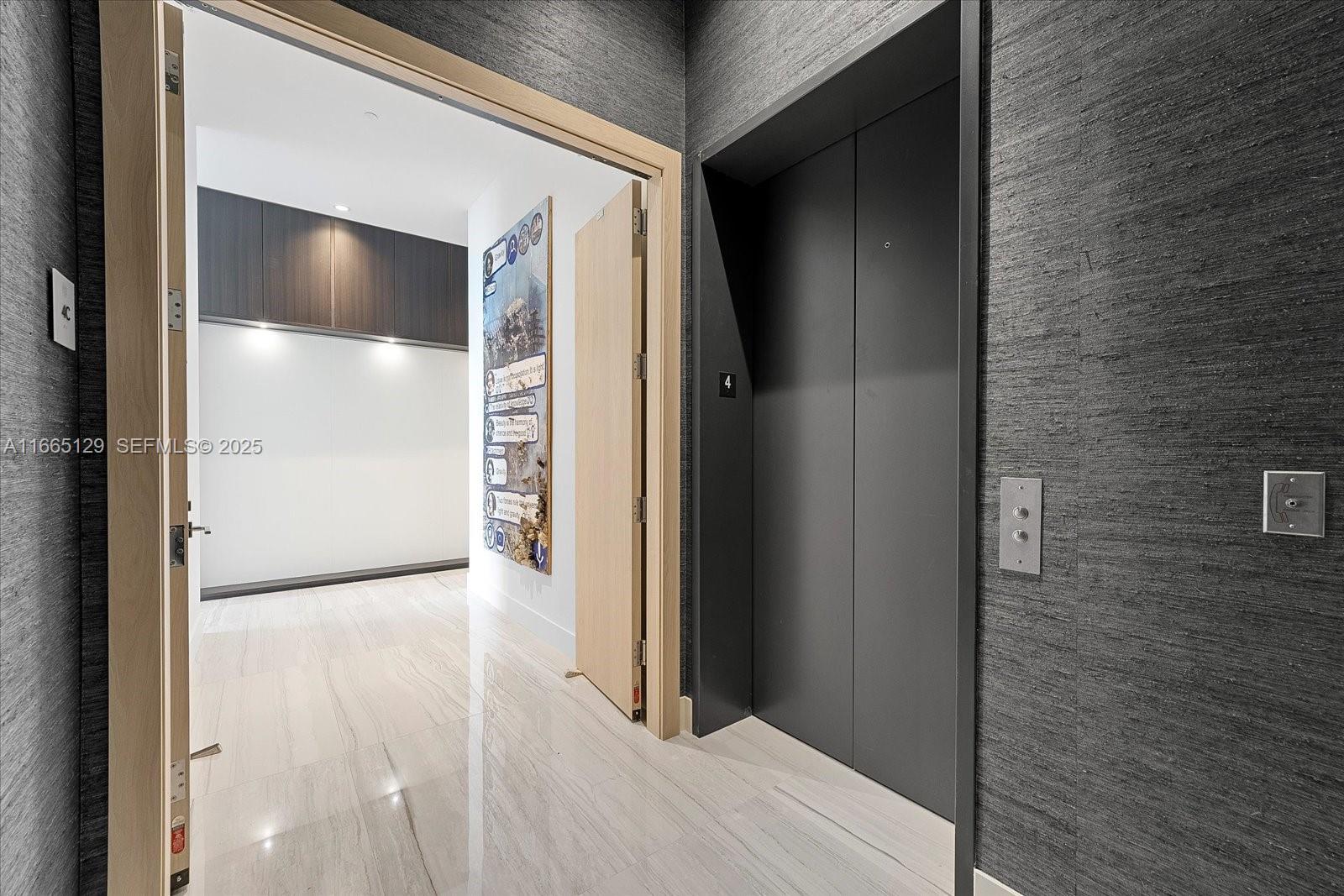 2811 South Bayshore Drive, Unit 4C Miami, FL 33133 - Photo 29 of 37 a view of elevator with hallway