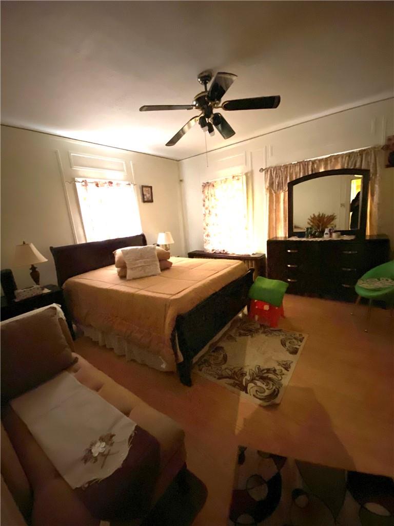 4058 Bronx Boulevard Bronx, NY 10466 - Photo 14 of 19 a bedroom with bed and window