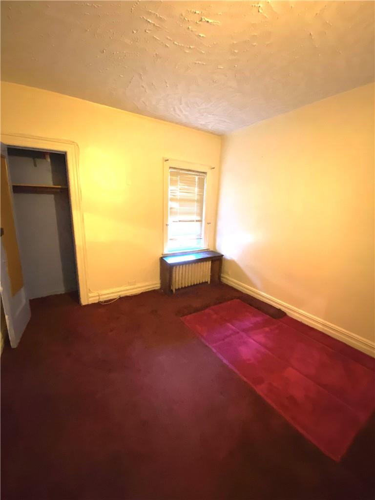4058 Bronx Boulevard Bronx, NY 10466 - Photo 9 of 19 a view of empty room with wooden floor and fan