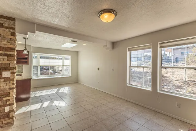 a view of an empty room with window