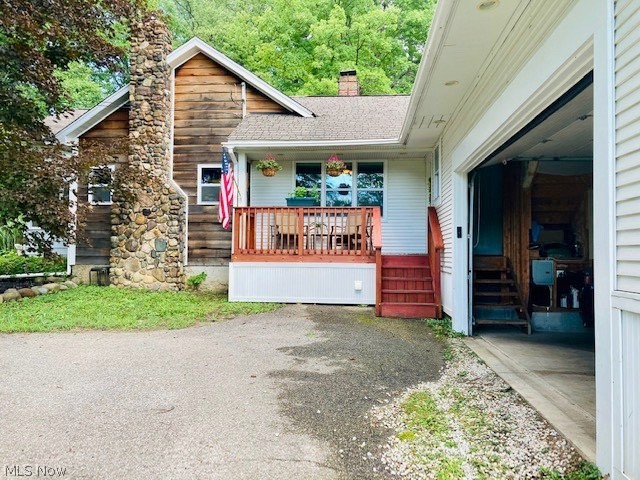 9825 Thwing Road Chardon, OH 44024 - Photo 25 of 34 Side entrance off deck