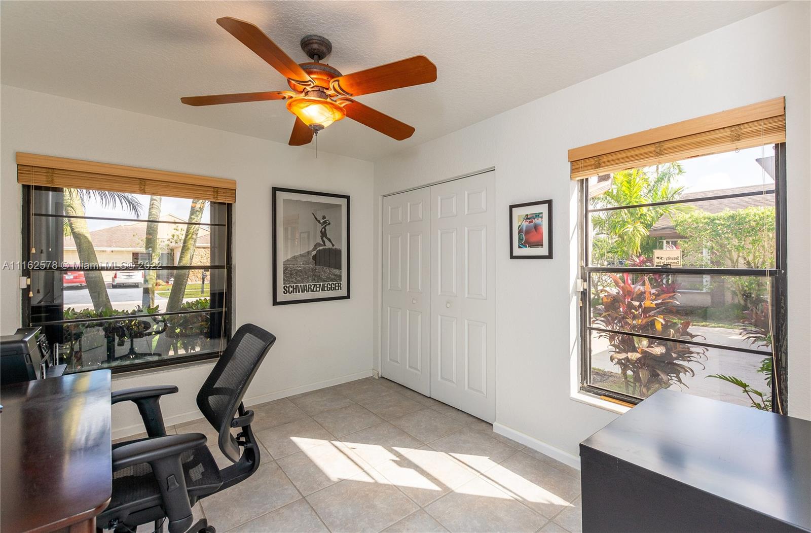11612 Quiet Waters Lane Boca Raton, FL 33428 - Photo 41 of 70 a workspace with furniture and window