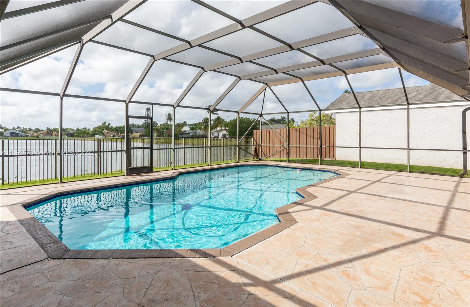 11612 Quiet Waters Lane Boca Raton, FL 33428 - Photo 52 of 70 a view of outdoor space with seating area