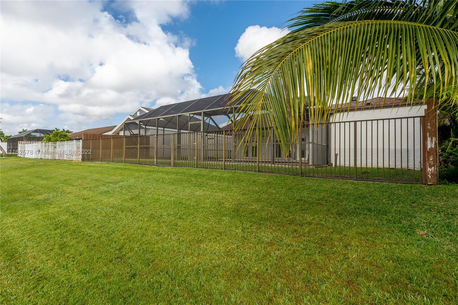 11612 Quiet Waters Lane Boca Raton, FL 33428 - Photo 62 of 70 a view of a back yard of the house