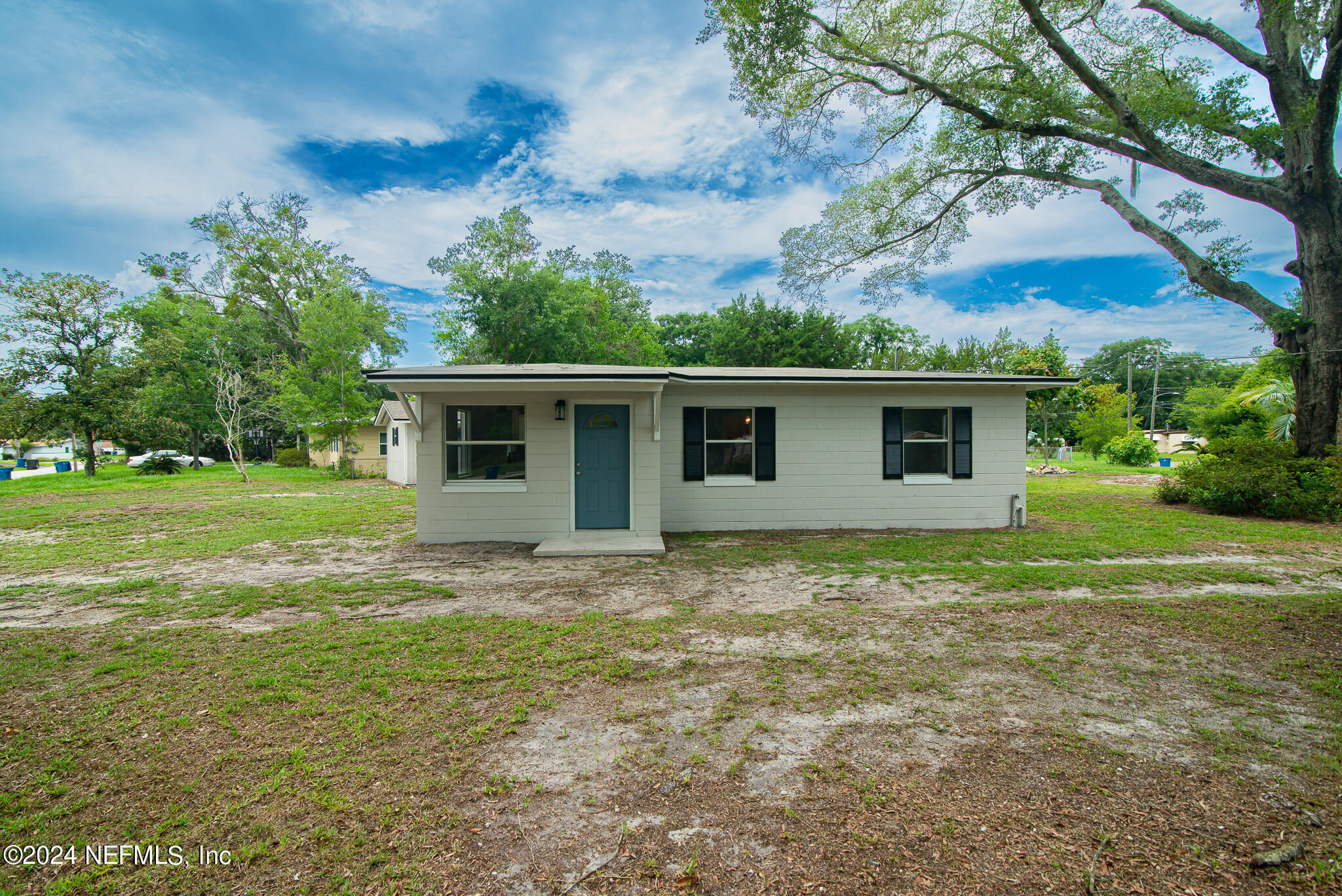 1702 King Arthur Road Jacksonville, FL 32211 - Photo 3 of 24 a view of a house with a yard