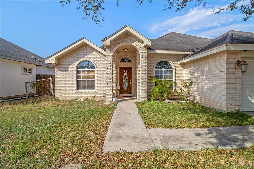 2509 Coma Street Hidalgo, TX 78557 - Photo 1 of 12 a front view of a house with garden