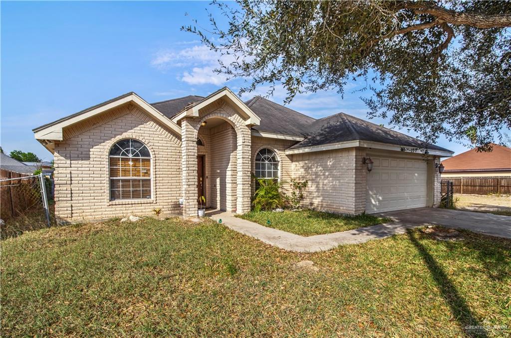 2509 Coma Street Hidalgo, TX 78557 - Photo 12 of 12 a front view of a house with a yard