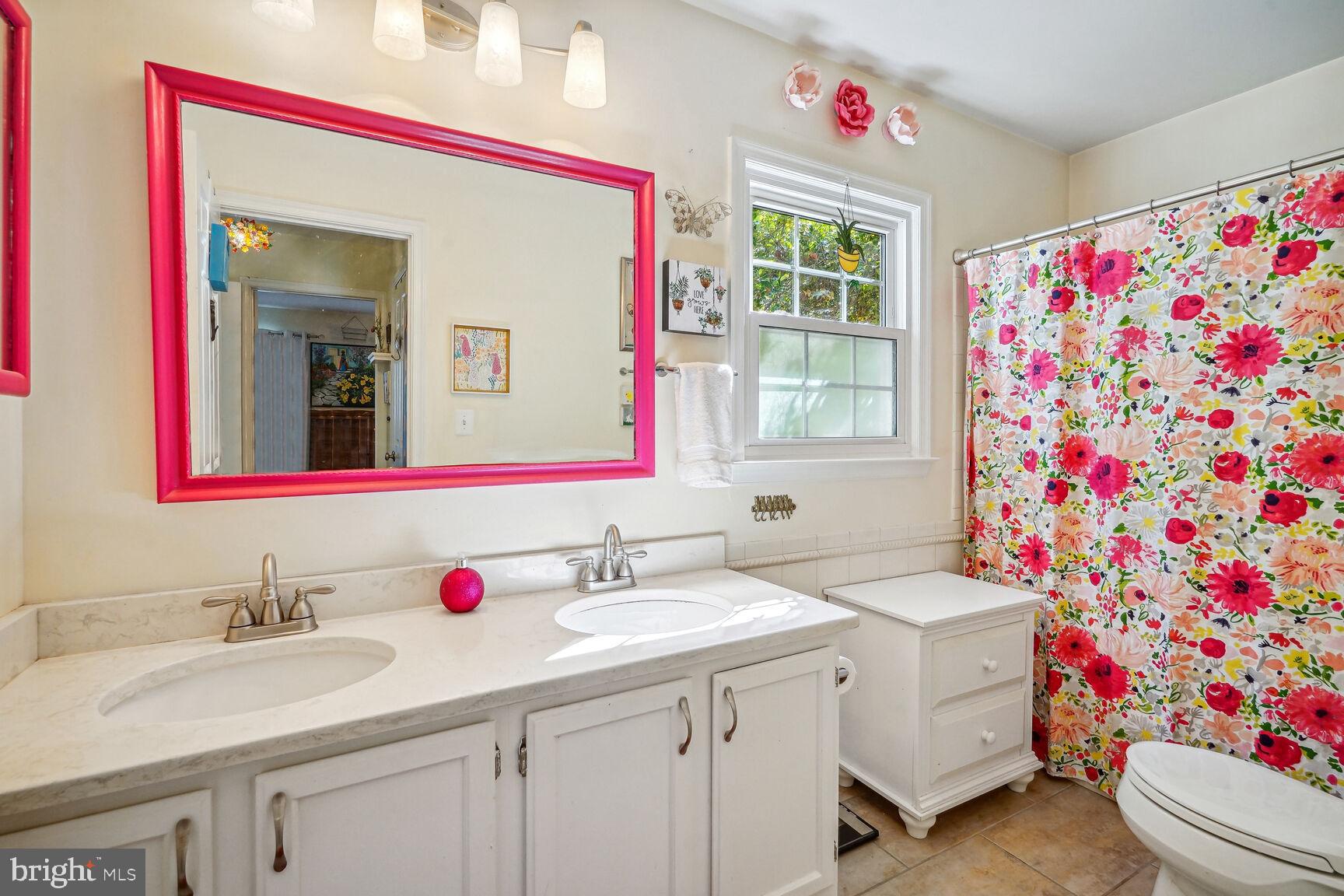 9348 Burke Road Burke, VA 22015 - Photo 19 of 55 Double sinks and tile flooring in Primary bath