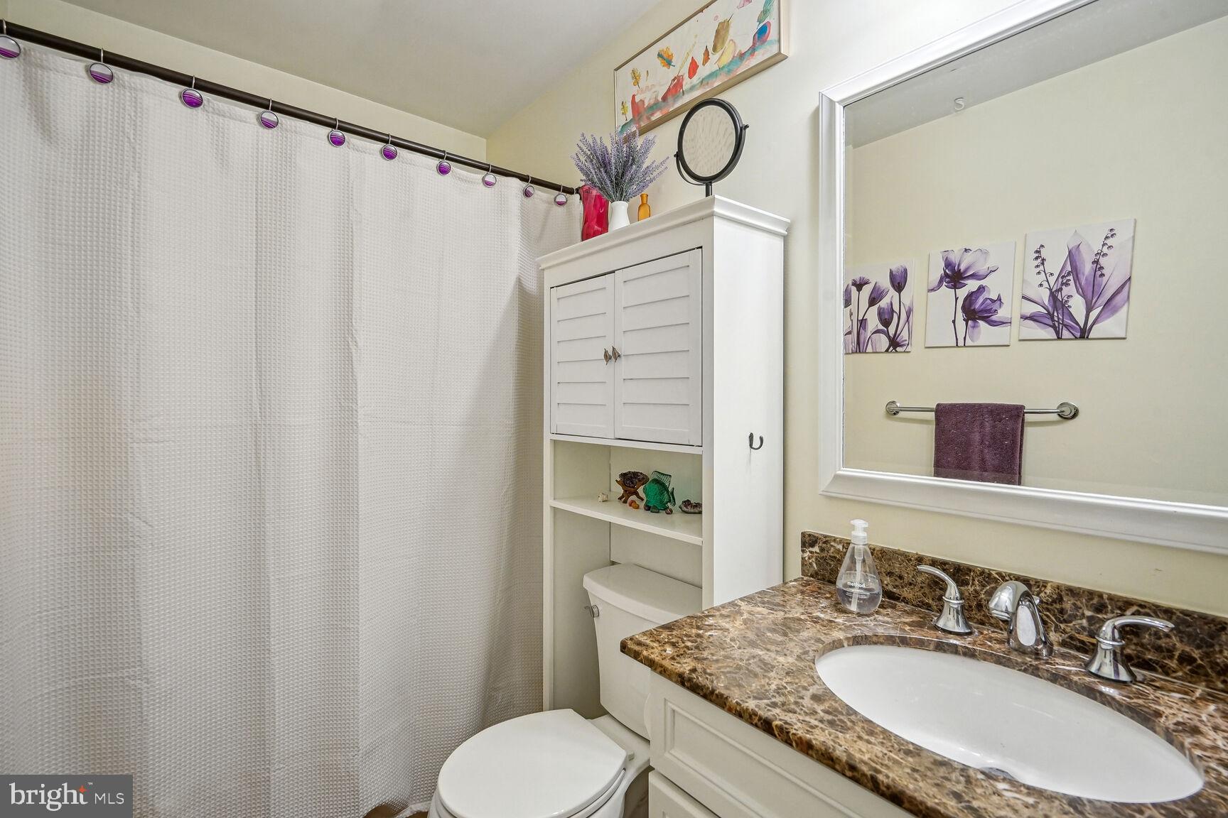 9348 Burke Road Burke, VA 22015 - Photo 25 of 55 Upstairs hall bath with granite and tile floors