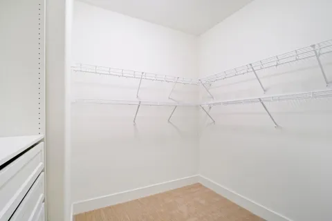 a view of a room with racks on the wall