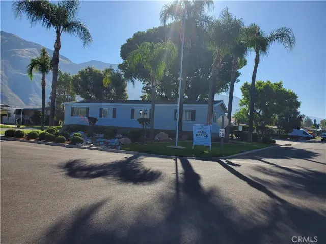 a view of a street with a building in the background