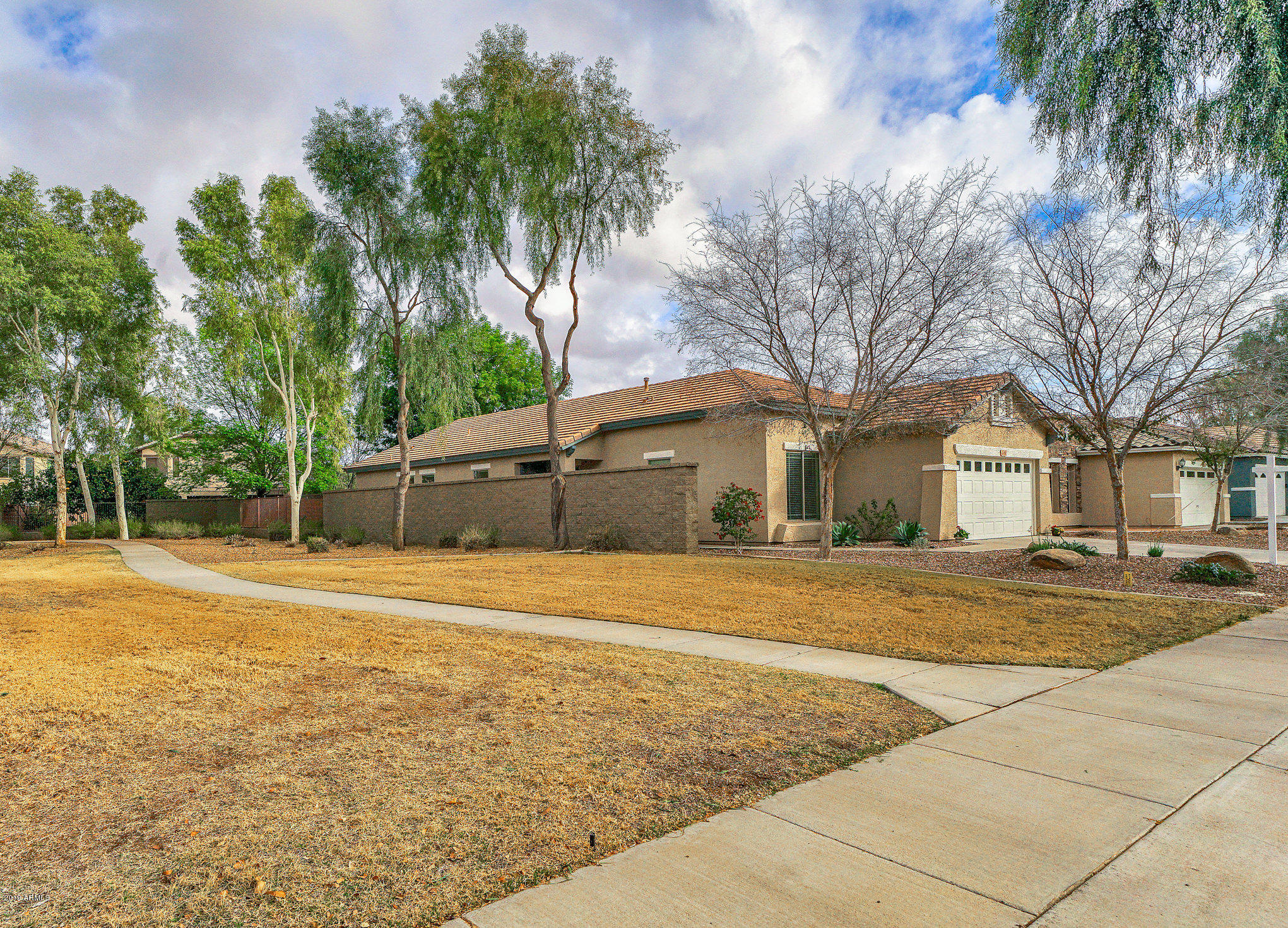 4596 East Murrieta Road Gilbert, AZ 85297 - Photo 3 of 44 102.5-FrontExterior_AdjacentGreenbelt