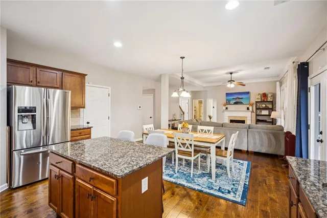 a balcony with furniture and wooden floor