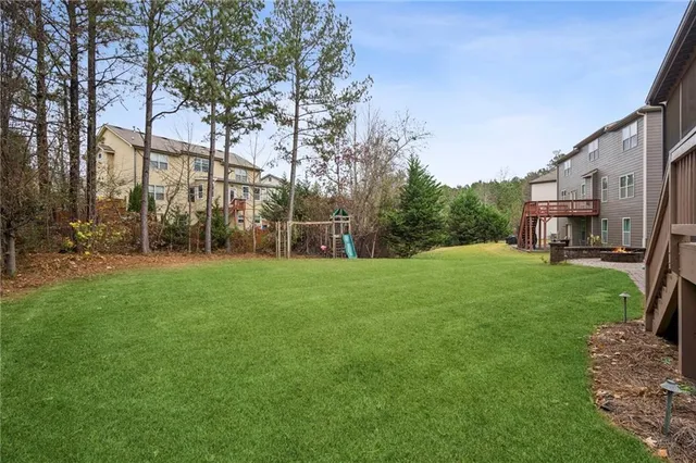 an aerial view of a house with a garden
