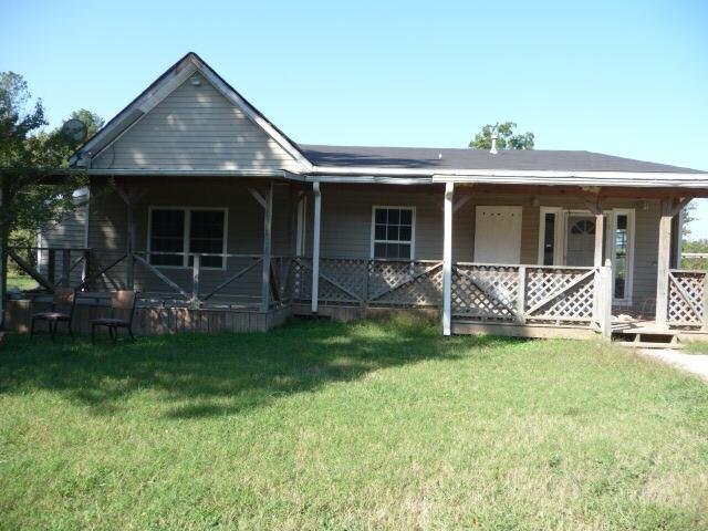 528 Line Creek Road Brooks, GA 30205 - Photo 1 of 1 a front view of a house with a yard