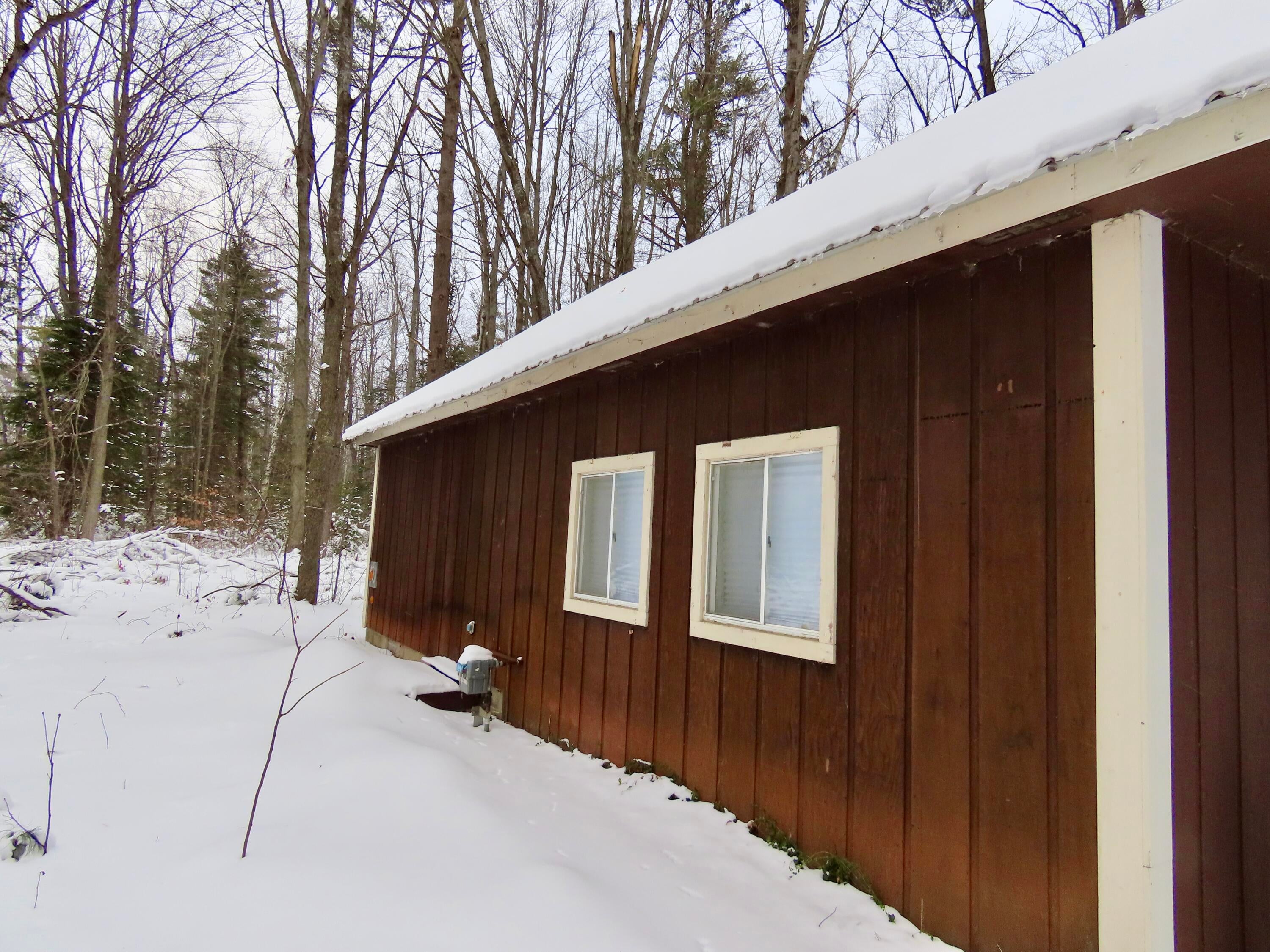 11595 Reimann Road Atlanta, MI 49709 - Photo 7 of 42 front of home