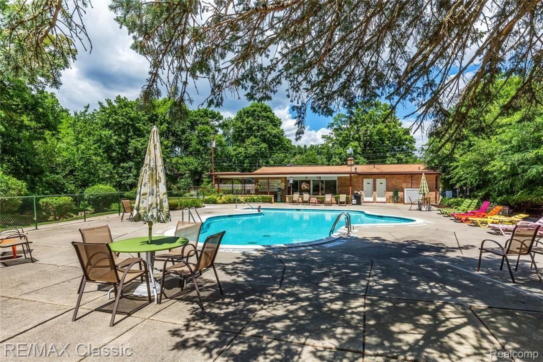 1199 South Sheldon Road, Unit 6 Plymouth, MI 48170 - Photo 6 of 17 The pool is heated.