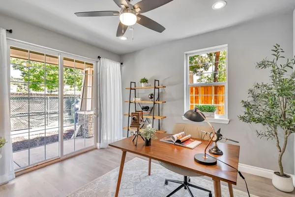 a living room with furniture and a window