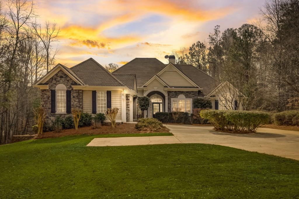 a front view of a house with a yard