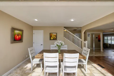 a view of a dining room with furniture