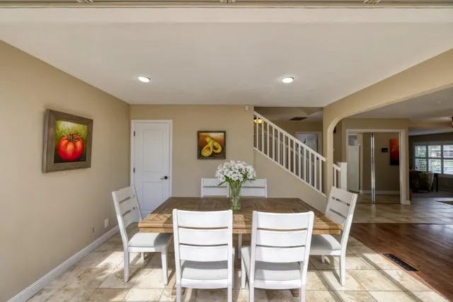 a view of a dining room with furniture