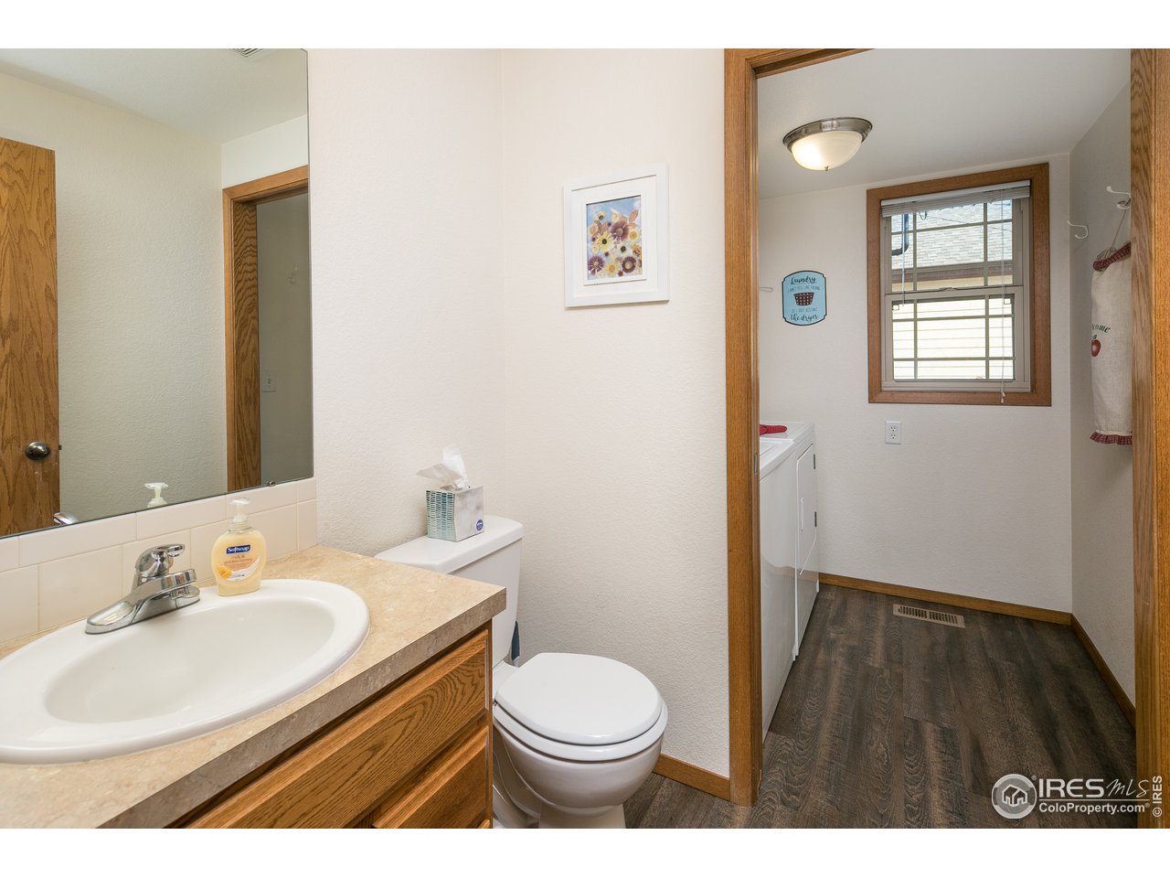 7306 23rd St Road Greeley, CO 80634 - Photo 15 of 40 Main Floor Powder Room and Laundry