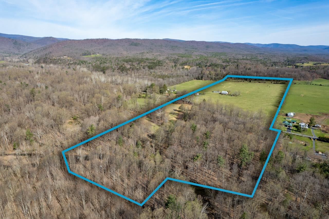 512 North River Road Mount Solon, VA 22843 - Photo 20 of 38 a view of a swimming pool with a yard