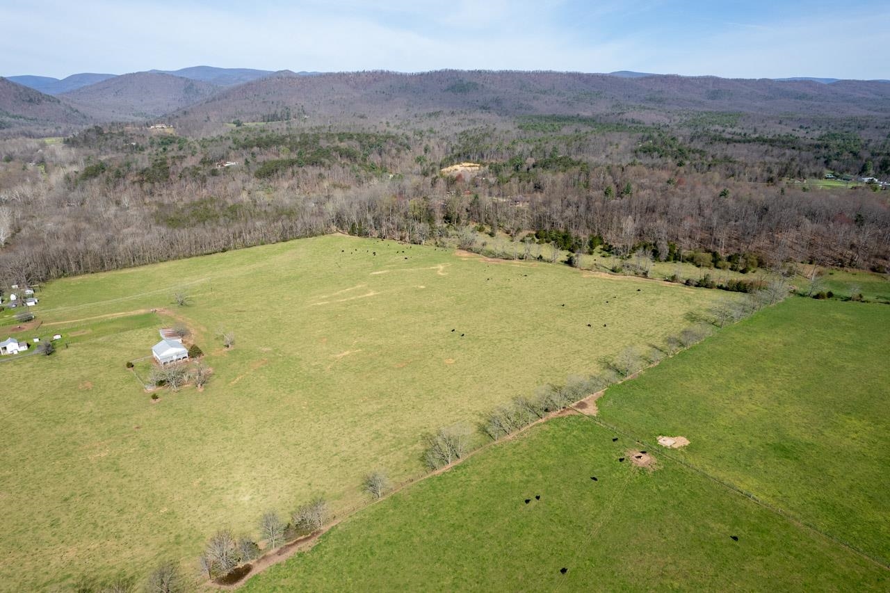 512 North River Road Mount Solon, VA 22843 - Photo 35 of 38 a view of a lake with mountains in the background