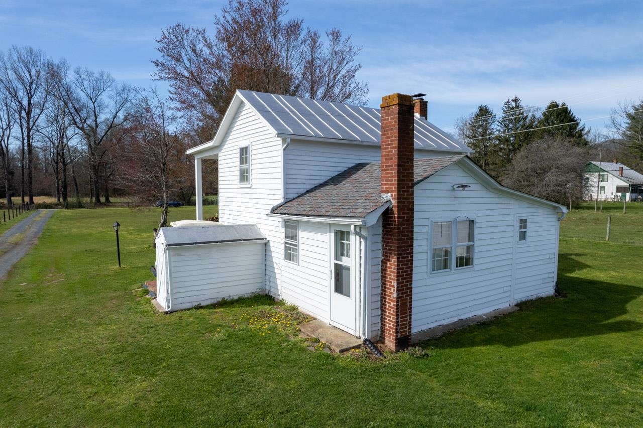 512 North River Road Mount Solon, VA 22843 - Photo 6 of 38 a front view of a house with garden