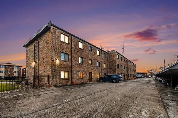 a car parked in front of a building