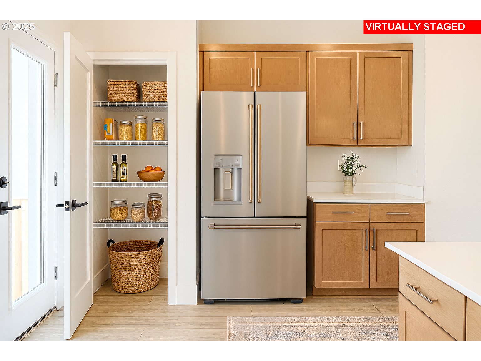 11910 Southwest 176th Drive Beaverton, OR 97007 - Photo 3 of 11 a kitchen with stainless steel appliances a refrigerator and cabinets