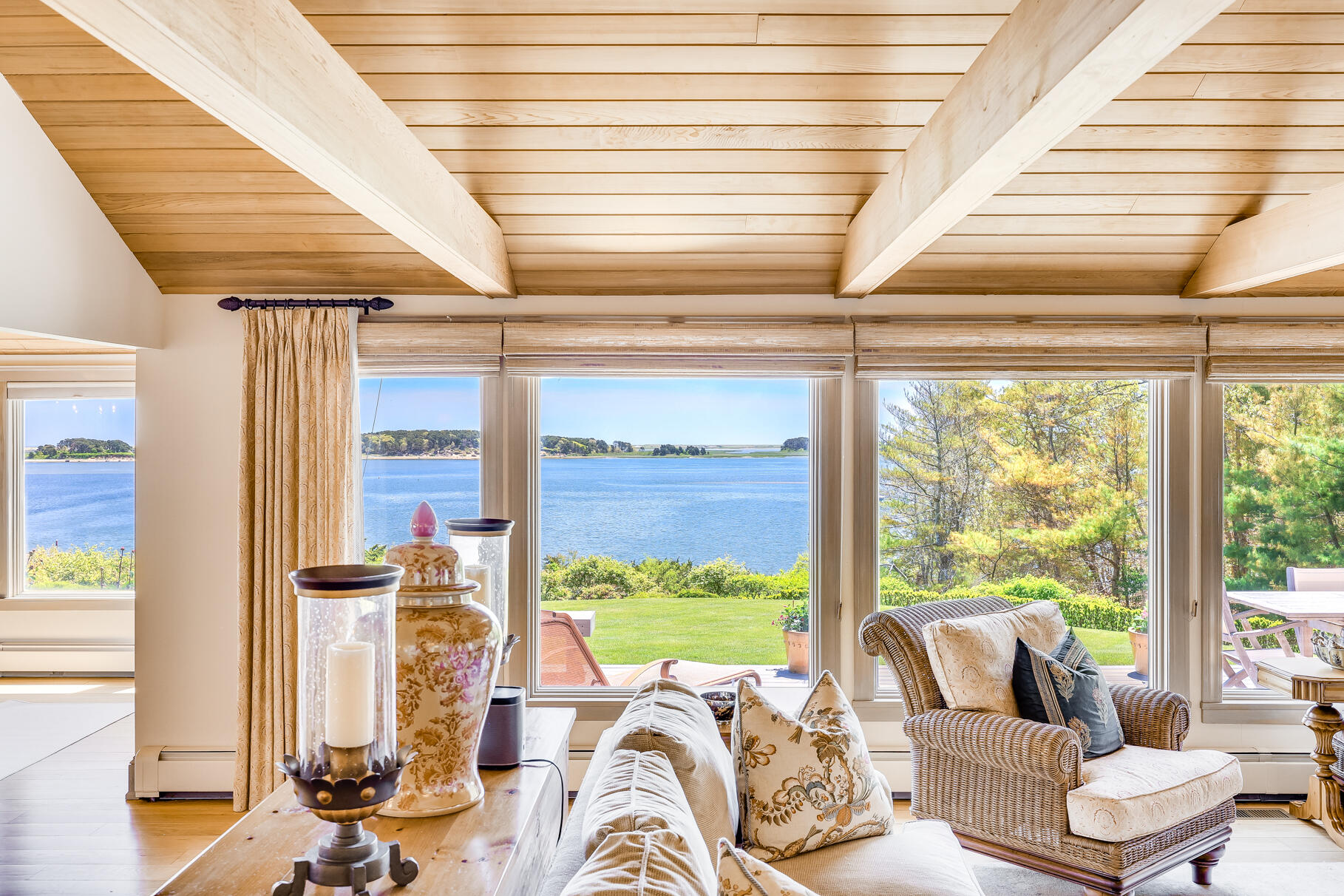 74-75 Viking Road Orleans, MA 02653 - Photo 12 of 69 a view of a living room with furniture and floor to ceiling windows