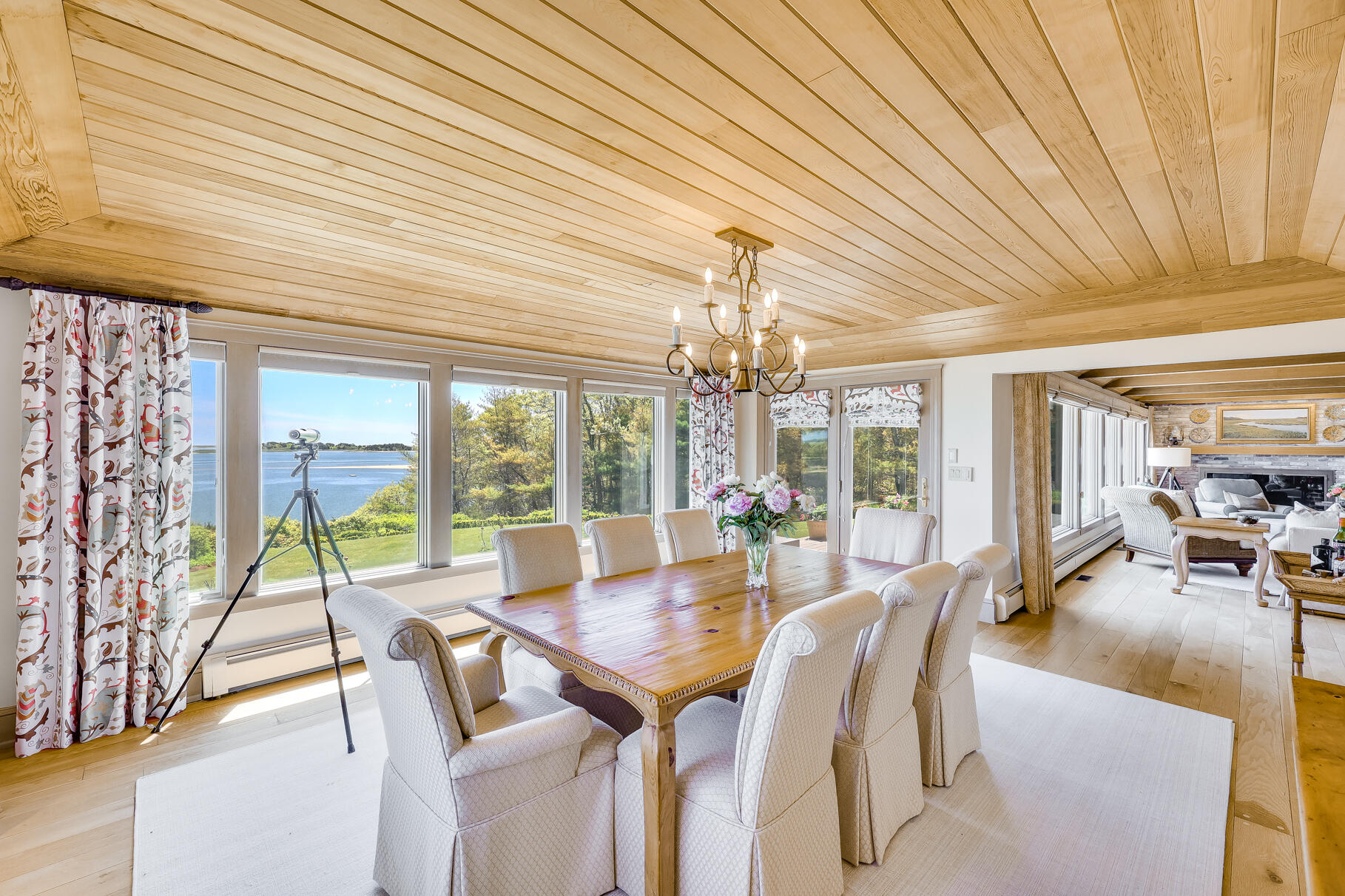 74-75 Viking Road Orleans, MA 02653 - Photo 14 of 69 a view of a dining room with furniture wooden floor and chandelier