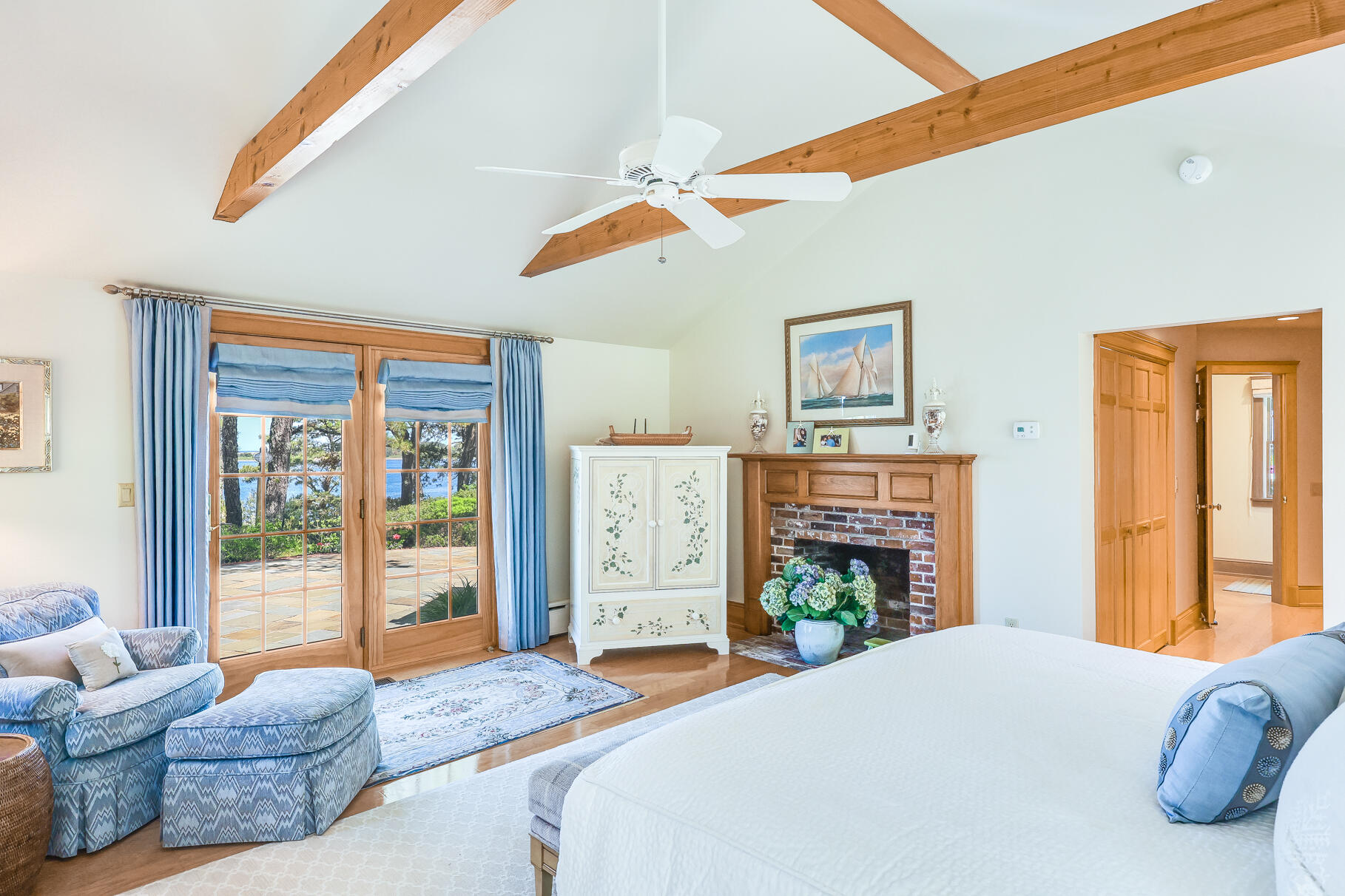 74-75 Viking Road Orleans, MA 02653 - Photo 21 of 69 a bedroom with furniture and a fireplace