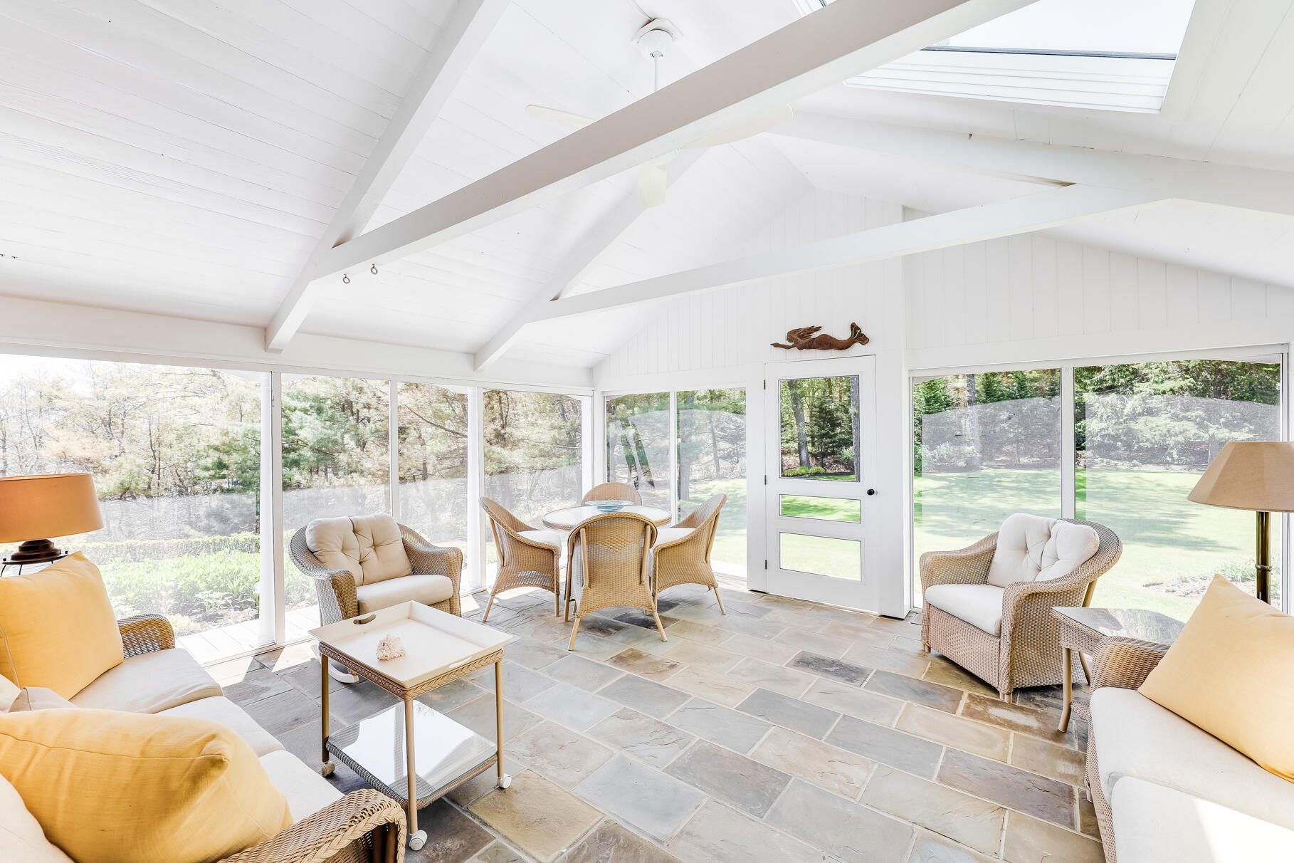 74-75 Viking Road Orleans, MA 02653 - Photo 27 of 69 a living room with furniture and a large window